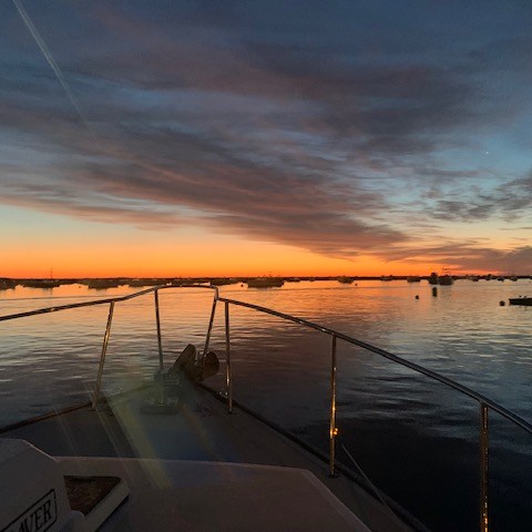 a sunset over a body of water
